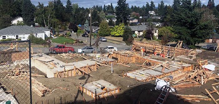 a construction site with wood frames around concrete